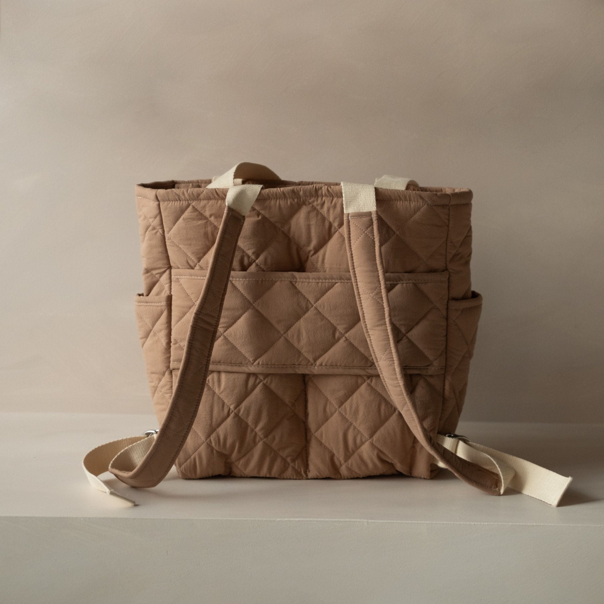 danskin quilted mini backpack Tan Quilted Backpack by Dans le Sac